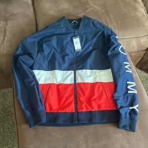 Tommy Hilfiger windbreaker.  Size Large.  Blue white and red